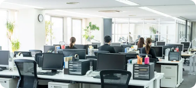 Lentra employees working at their desks in the office