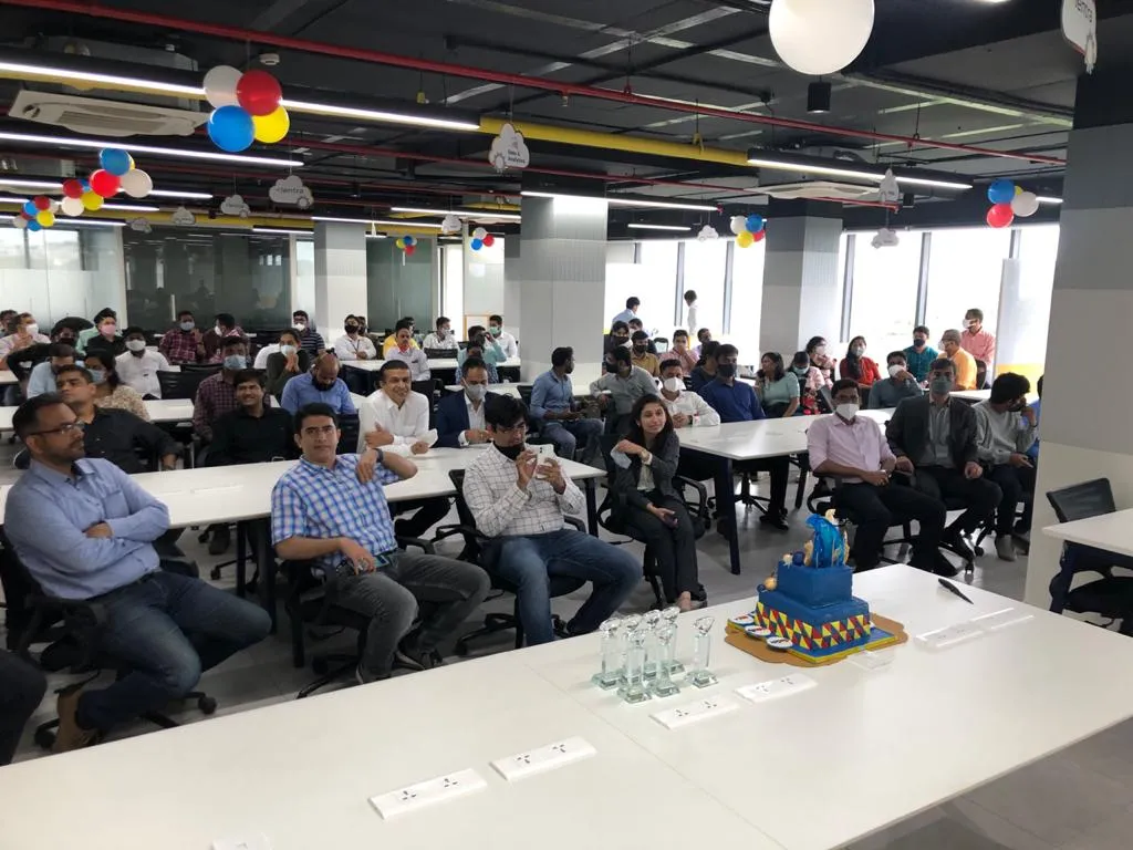 Lentra team celebrating together at an office event