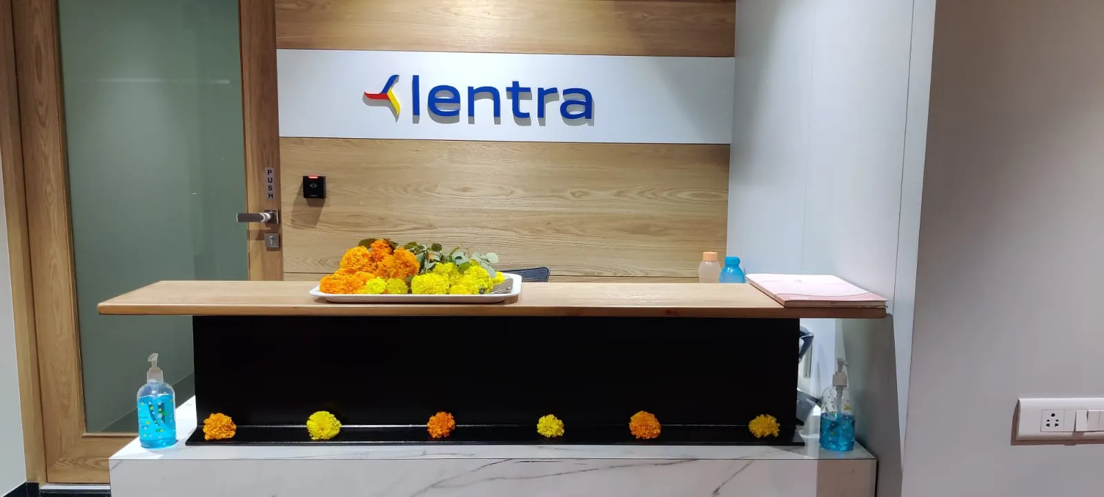 Lentra office reception decorated with flowers for a festival