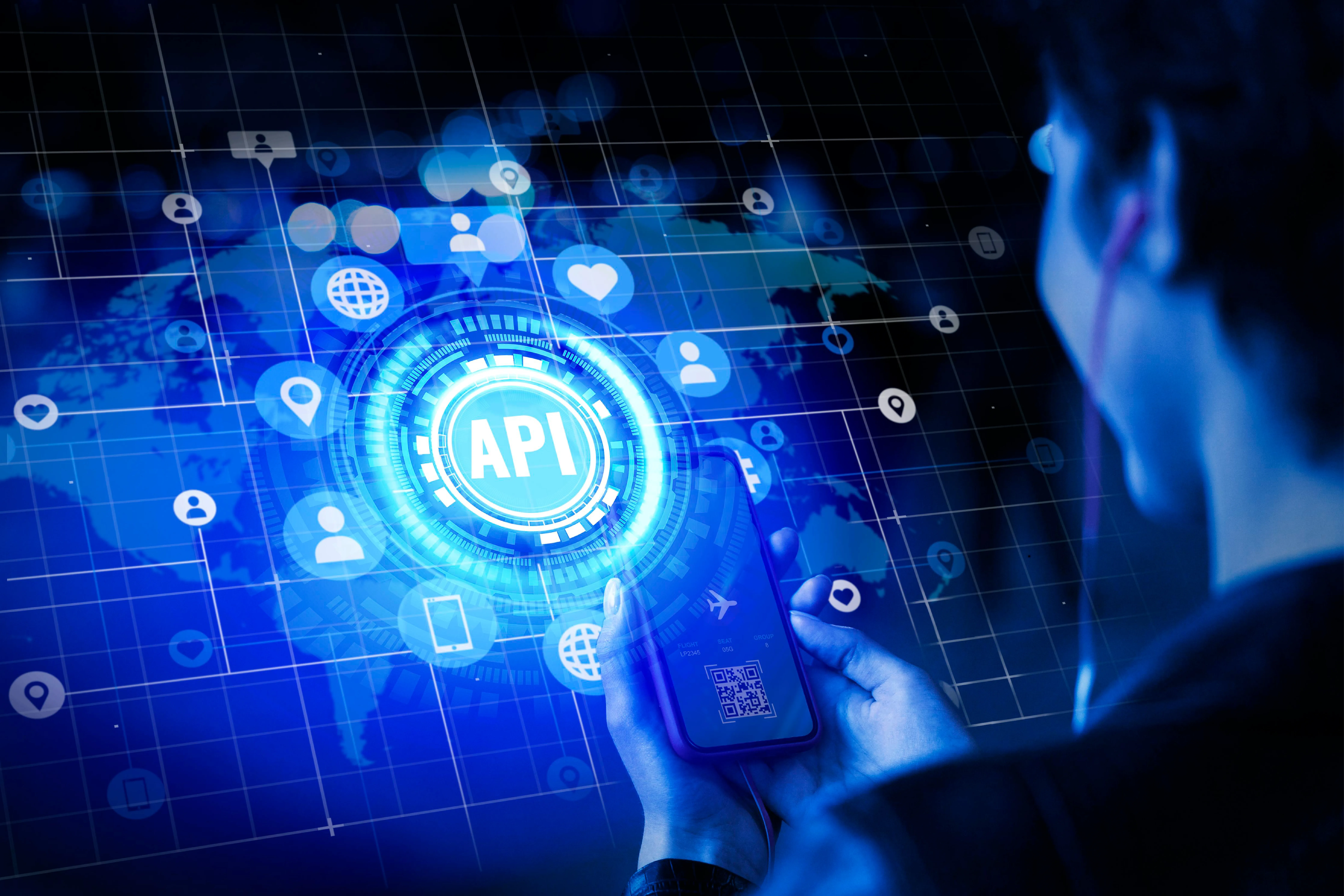 Person using a mobile phone with API-driven digital connectivity illustration